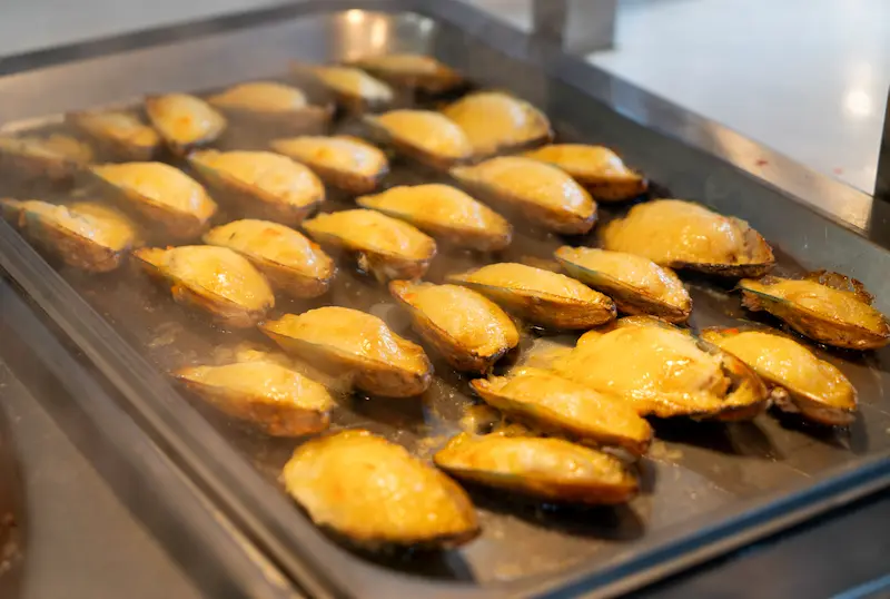 Baked Shellfish with Cheese Topping
